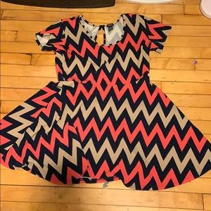 Pink, navy blue, and tan dress